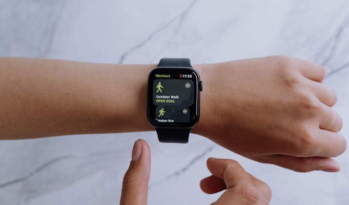 How to Change Your Name on Your Apple Watch 1 Apple Watch tracking outdoor walk workout with fitness goal on wrist"