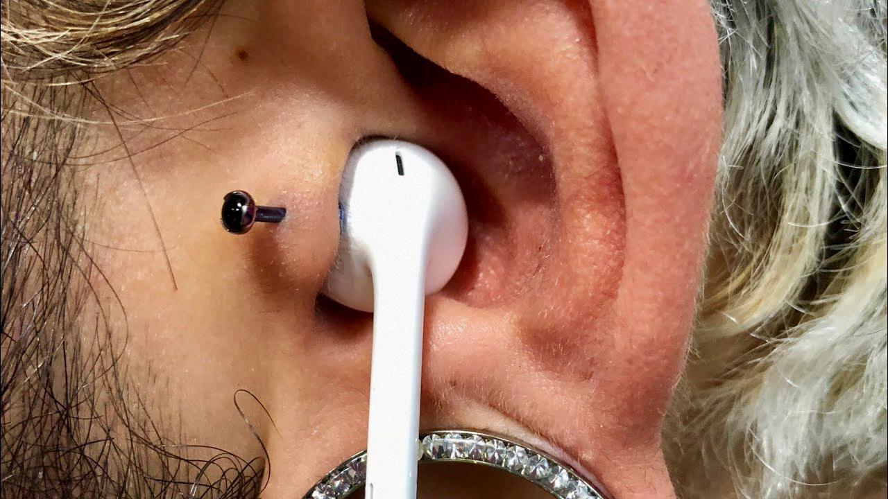 tragus piercing and headphones tragus piercing and headphones