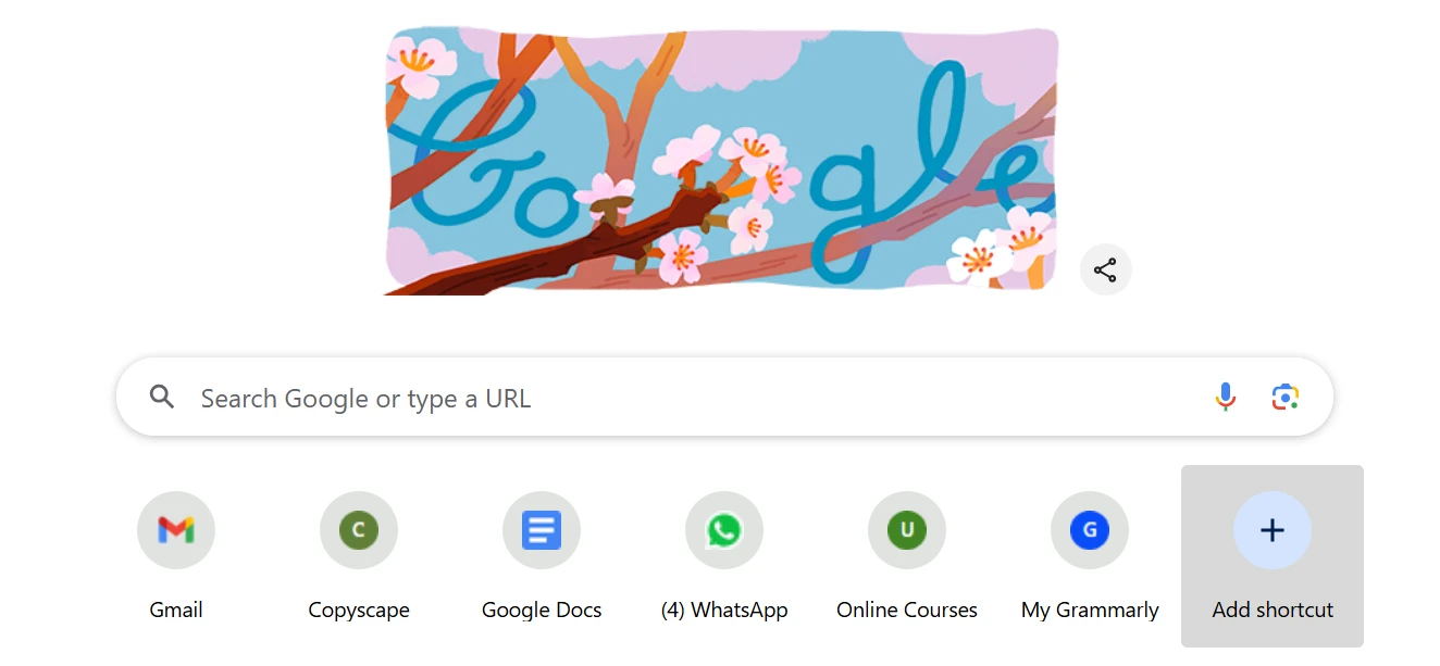 Google Chrome New Tab page with spring Google Doodle, search bar, and app shortcuts.