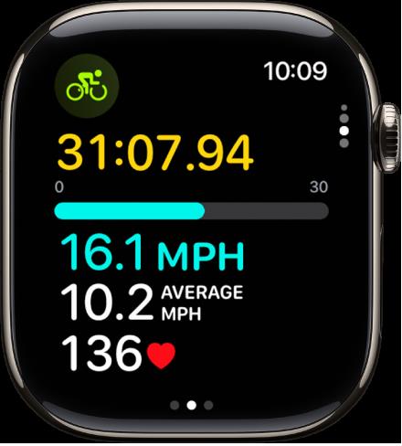 Close-up of an Apple Watch screen showing cycling workout data including duration, speed, average speed, and heart rate.