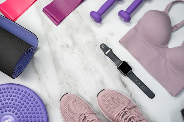 How To Lock Apple Watch During Workout 1 Flat lay of fitness gear with Apple Watch